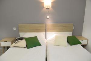 Postel nebo postele na pokoji v ubytování Calma apartment