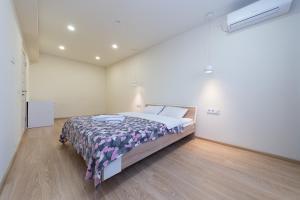Katil atau katil-katil dalam bilik di FlatRent SmartHouse