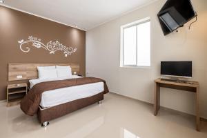 Televisi dan/atau pusat hiburan di Hotel Solec Piura