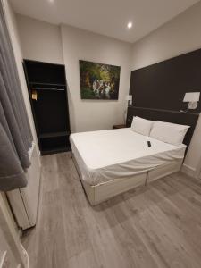 Postel nebo postele na pokoji v ubytování W6 Hotel