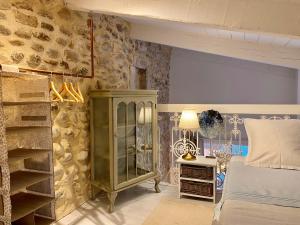 Postel nebo postele na pokoji v ubytování Porte de Provence - Gorge de l'Ardèche