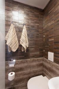 Kúpeľňa v ubytovaní Piu Trendy Rooms + 17 fotografií