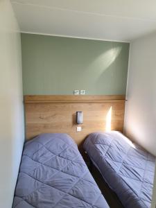 Un ou plusieurs lits dans un hébergement de l'établissement MOBIL-HOME OHARA 2020