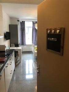 Kuchyň nebo kuchyňský kout v ubytování Apartment by Mario