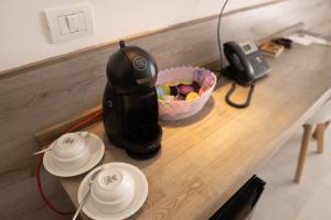 Set per la preparazione di tè e caffè presso Sobrado Boutique Hotel