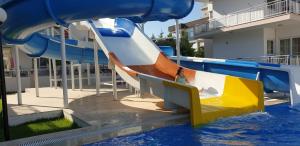 The swimming pool at or close to Antalya belek 4 nirvana club first floor two bedrooms pool view with water slide close to center - belek beach park
