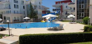 The swimming pool at or close to Antalya belek 4 nirvana club first floor two bedrooms pool view with water slide close to center - belek beach park