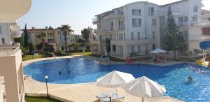 The swimming pool at or close to Antalya belek 4 nirvana club first floor two bedrooms pool view with water slide close to center - belek beach park