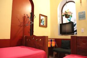 Voodi või voodid majutusasutuse Hostel Casa Zalaoui toas