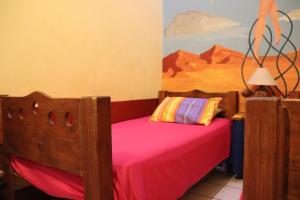 Voodi või voodid majutusasutuse Hostel Casa Zalaoui toas