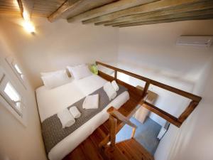 A bed or beds in a room at Villa in Mykonos near Agios Sostis Beach