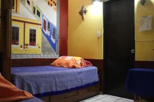 Voodi või voodid majutusasutuse Hostel Casa Zalaoui toas