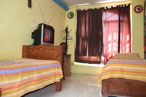Voodi või voodid majutusasutuse Hostel Casa Zalaoui toas
