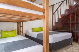 מיטה או מיטות קומותיים בחדר ב-Ayenda 1258 Boutique Laureles Home