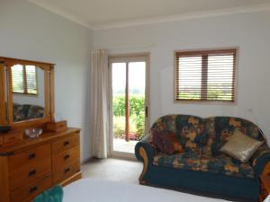 Posezení v ubytování Kauri Lodge Karapiro