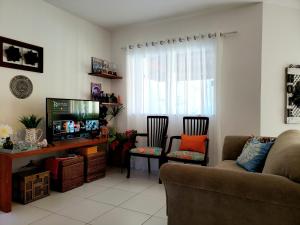 Кът за сядане в Excelente Duplex em Arembepe Aquaville - Bahia