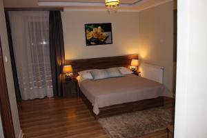 Postel nebo postele na pokoji v ubytování PIANO CAFE b&b