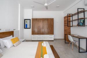 Postel nebo postele na pokoji v ubytování ARENA BY SERENDIA Aparthotel