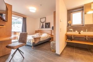 Posteľ alebo postele v izbe v ubytovaní Chalet Dorf Wagrain Alpenleben by AlpenTravel