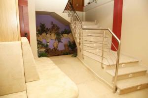 a staircase in a house with a stair case at Hotel HHB Pontevedra Confort in Pontevedra