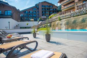 Bazén v ubytovaní Chalet Dorf Wagrain Alpenleben by AlpenTravel alebo v jeho blízkosti