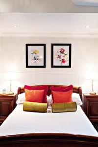 A bed or beds in a room at Sparth House Hotel 
