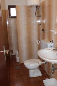 Koupelna v ubytování Apartments Petrada