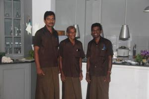 a group of three men standing in a kitchen at Asian Jewel Boutique Hotel in Hikkaduwa +57 photos