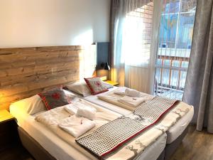 Posteľ alebo postele v izbe v ubytovaní FerienPark Kreischberg by ALPS RESORTS