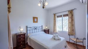 Postel nebo postele na pokoji v ubytování Casa La Choza de Mamuyo Montefrio by Ruralidays