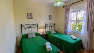Posteľ alebo postele v izbe v ubytovaní Casa Quintero 4 dorm Conil de la Frontera by Ruralidays + 32 fotografií