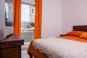 Postel nebo postele na pokoji v ubytování Rooms Vesna