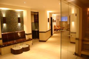 TV a/nebo společenská místnost v ubytování Eden-Hotel