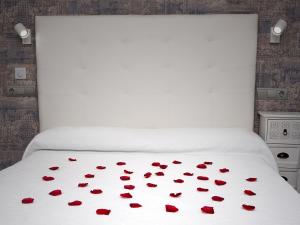 Ein Bett oder Betten in einem Zimmer der Unterkunft Hotel Castillo Benidorm