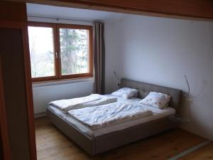 Postel nebo postele na pokoji v ubytování Ferienwohnung Siloblick