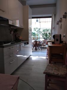 A kitchen or kitchenette at La Casetta - Near the sea & free parking