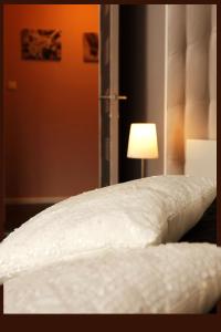 Gîte Pause Nature Saint-Hubert客房内的一张或多张床位