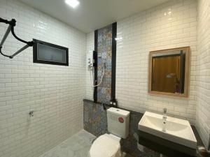 Koupelna v ubytování Piumsuk Villa
