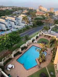 Vaade basseinile majutusasutuses Unit 62 Sealodge Umhlanga Beach või selle lähedal