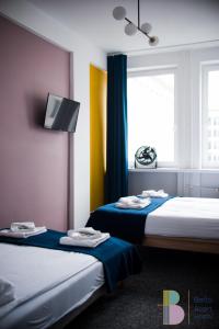 Postel nebo postele na pokoji v ubytování Bello ApartHostel Private Rooms