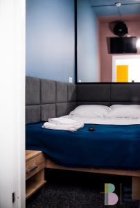 Posteľ alebo postele v izbe v ubytovaní Bello ApartHostel Private Rooms