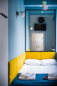 Posteľ alebo postele v izbe v ubytovaní Bello ApartHostel Private Rooms