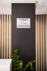 Certifikát, ocenenie alebo iný dokument vystavený v ubytovaní Bello ApartHostel Private Rooms
