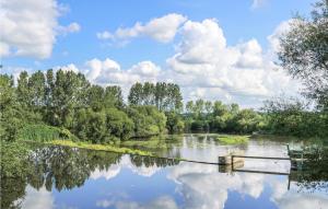 a body of water with trees and clouds in the sky at 2 Bedroom Cozy Home In La Meauffe in La Meauffe +19 photos