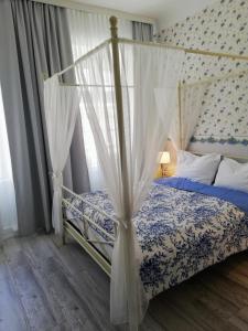 Postel nebo postele na pokoji v ubytování Boutique Hotel Kugel Wien