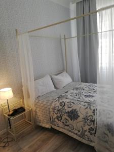 Postel nebo postele na pokoji v ubytování Boutique Hotel Kugel Wien