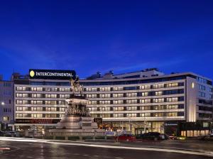 a large building with a statue in front of it at InterContinental Sofia by IHG in Sofia