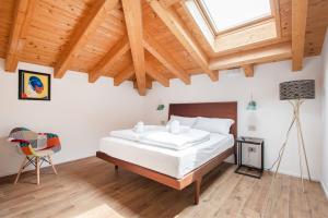 A bed or beds in a room at Casa Joanna