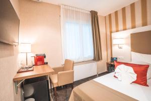 Voodi või voodid majutusasutuse My Home Hotel - Free Parking toas