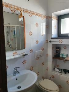 Koupelna v ubytování TORCHIO - Appartementi Il Palmento
